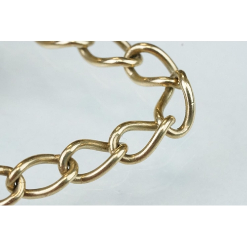 227 - 9ct yellow gold curb link bracelet, heart shaped padlock clasp