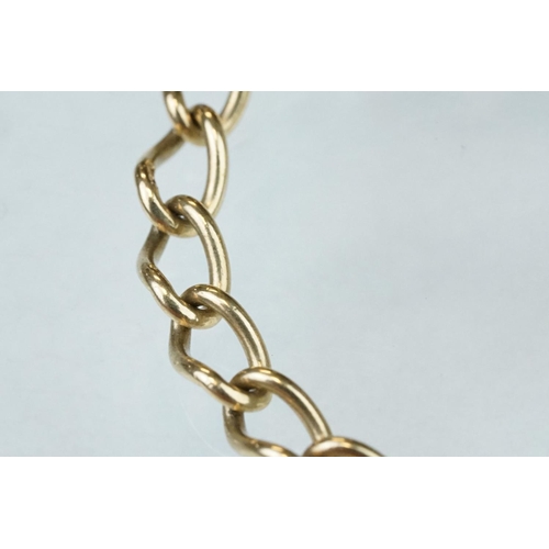 227 - 9ct yellow gold curb link bracelet, heart shaped padlock clasp