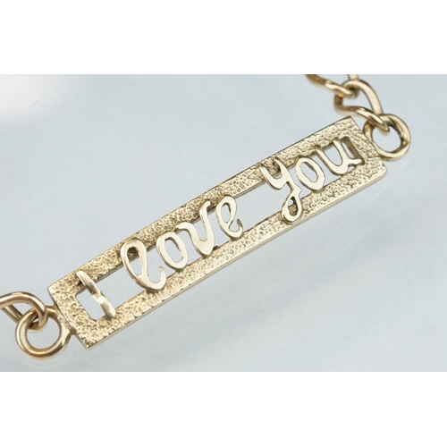 229 - 9ct yellow gold curb link identity style bracelet with 'I love you' panel, bolt ring clasp, length a... 