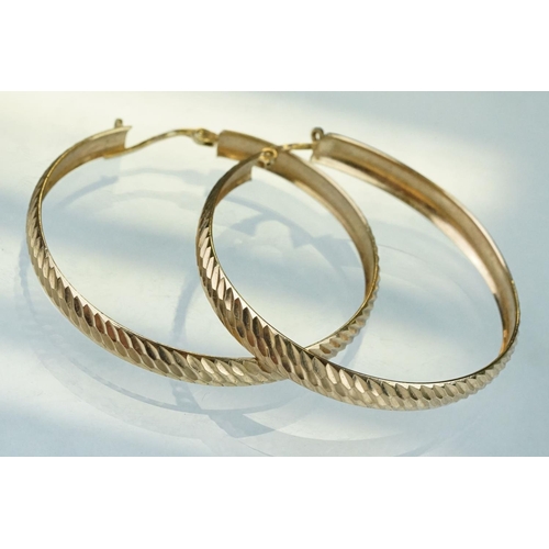 230 - Pair of 9ct yellow gold hoop earrings, engraved textured decoration, diameter approx 4cm