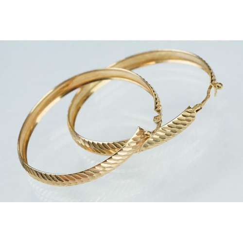 230 - Pair of 9ct yellow gold hoop earrings, engraved textured decoration, diameter approx 4cm