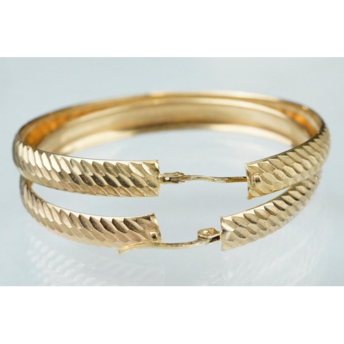 230 - Pair of 9ct yellow gold hoop earrings, engraved textured decoration, diameter approx 4cm