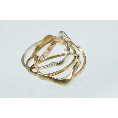 235 - Tri colour 9ct gold interlocking ring, yellow, white and rose gold, knot, style, ring size M½