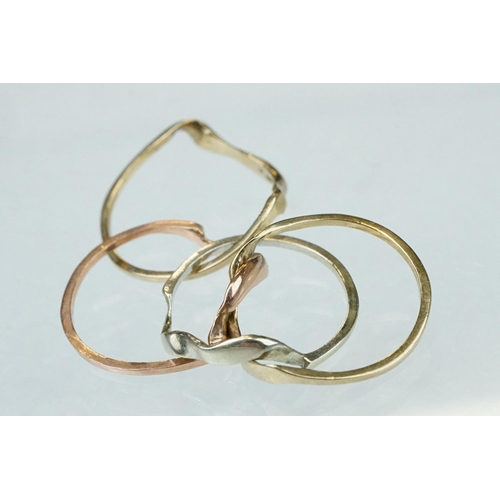 235 - Tri colour 9ct gold interlocking ring, yellow, white and rose gold, knot, style, ring size M½