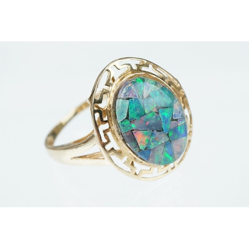 237 - Opal triplet 10ct yellow gold ring, the central panel measuring approx 14mm x 10mm, rub over set, pi... 