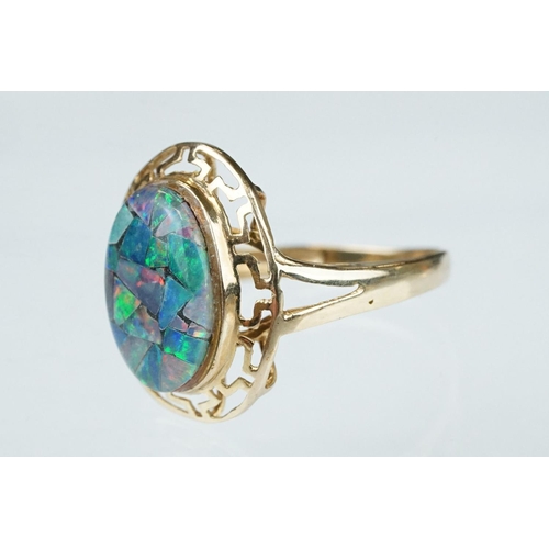 237 - Opal triplet 10ct yellow gold ring, the central panel measuring approx 14mm x 10mm, rub over set, pi... 