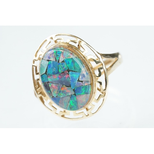 237 - Opal triplet 10ct yellow gold ring, the central panel measuring approx 14mm x 10mm, rub over set, pi... 