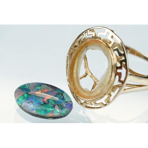 237 - Opal triplet 10ct yellow gold ring, the central panel measuring approx 14mm x 10mm, rub over set, pi... 