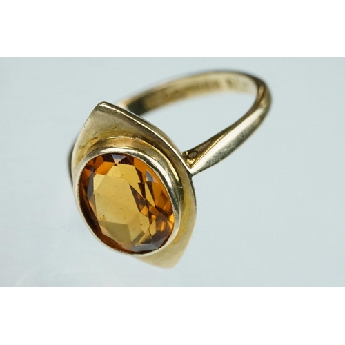 239 - Citrine 9ct yellow gold ring, the oval mixed cut citrine measuring approx 10mm x 8mm, rubover set, m... 