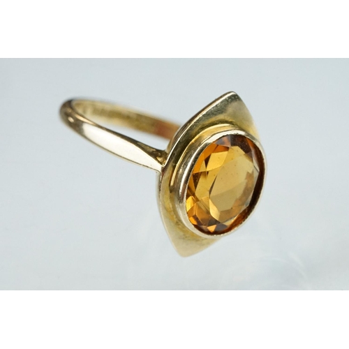 239 - Citrine 9ct yellow gold ring, the oval mixed cut citrine measuring approx 10mm x 8mm, rubover set, m... 