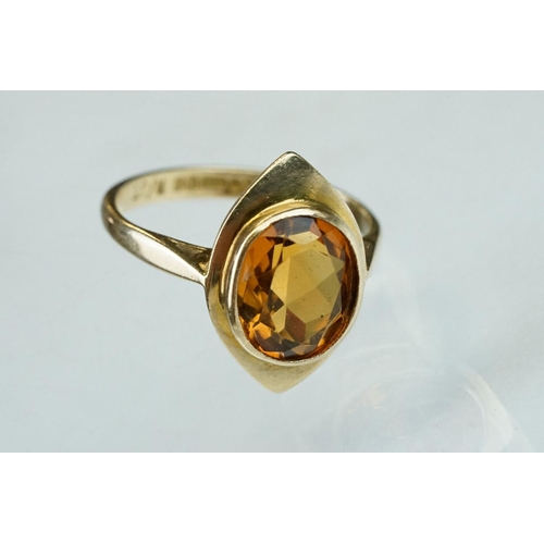 239 - Citrine 9ct yellow gold ring, the oval mixed cut citrine measuring approx 10mm x 8mm, rubover set, m... 