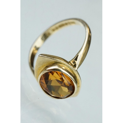 239 - Citrine 9ct yellow gold ring, the oval mixed cut citrine measuring approx 10mm x 8mm, rubover set, m... 