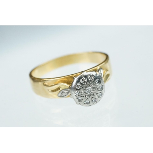 240 - Diamond 10ct yellow gold crossover ring, three small round brilliant cut diamonds, total diamond wei... 