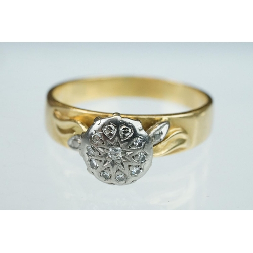 240 - Diamond 10ct yellow gold crossover ring, three small round brilliant cut diamonds, total diamond wei... 