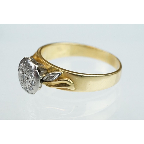 240 - Diamond 10ct yellow gold crossover ring, three small round brilliant cut diamonds, total diamond wei... 