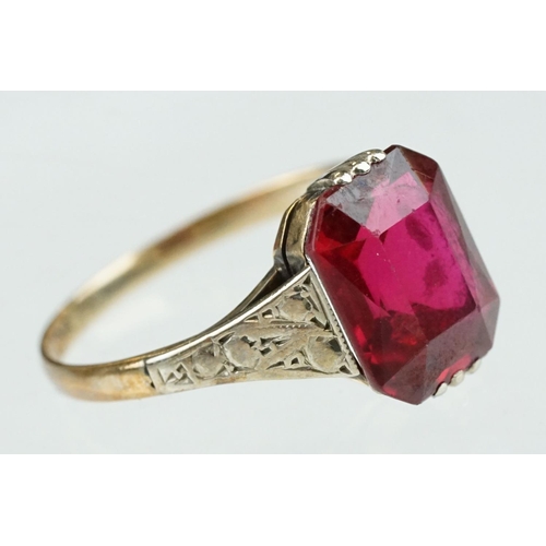 242 - Synthetic ruby 9ct gold dress ring, size L½; paste 9ct yellow gold dress ring, size O together with ... 