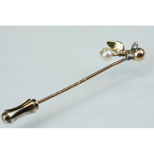 244 - Victorian diamond and pearl yellow and rose metal stick pin modelled as a sprig, small freshwater pe... 