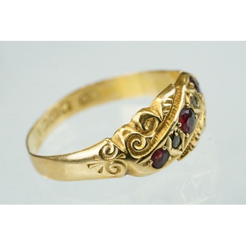 245 - Early 20th century ruby and diamond 18ct yellow gold ring, three small round mixed cut rubies, two s... 