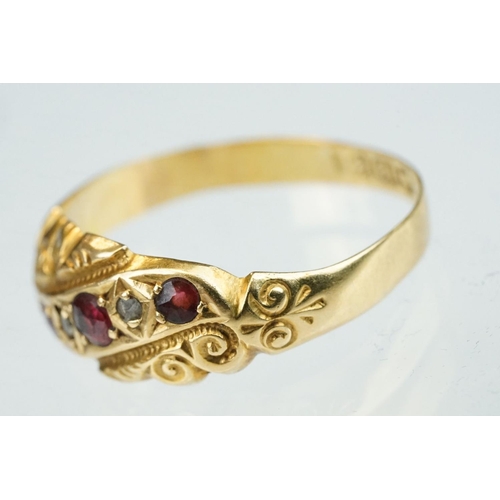 245 - Early 20th century ruby and diamond 18ct yellow gold ring, three small round mixed cut rubies, two s... 