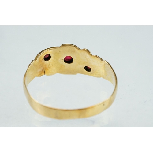 245 - Early 20th century ruby and diamond 18ct yellow gold ring, three small round mixed cut rubies, two s... 