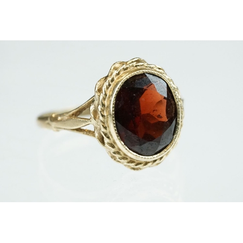 250 - Garnet 9ct yellow gold dress ring, size L; precious white opal 9ct rose gold dress ring, size L½ and... 