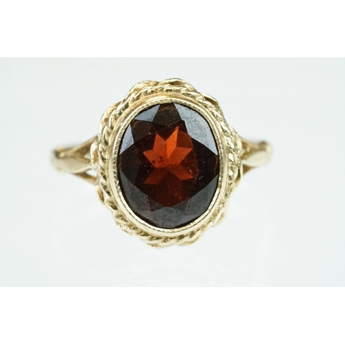 250 - Garnet 9ct yellow gold dress ring, size L; precious white opal 9ct rose gold dress ring, size L½ and... 