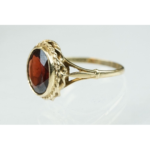 250 - Garnet 9ct yellow gold dress ring, size L; precious white opal 9ct rose gold dress ring, size L½ and... 