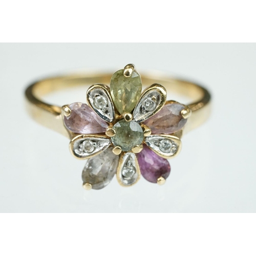 251 - Amethyst, quartz, prasiolite, pink stone and diamond 9ct yellow gold flower head ring, diameter of h... 