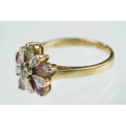 251 - Amethyst, quartz, prasiolite, pink stone and diamond 9ct yellow gold flower head ring, diameter of h... 