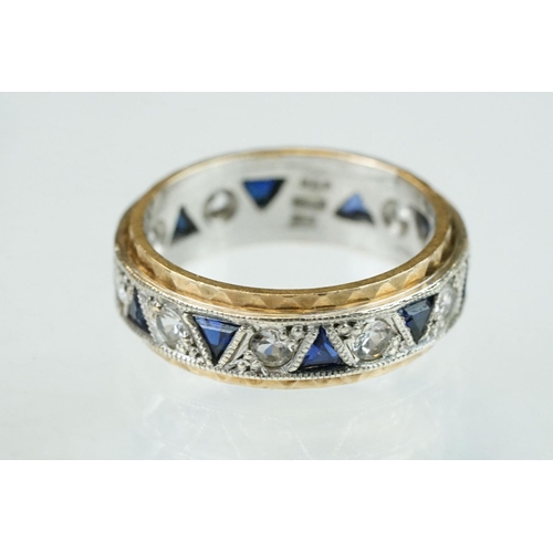 253 - Sapphire and white stone 9ct yellow and white gold eternity ring, ten small triangular mixed cut sap... 