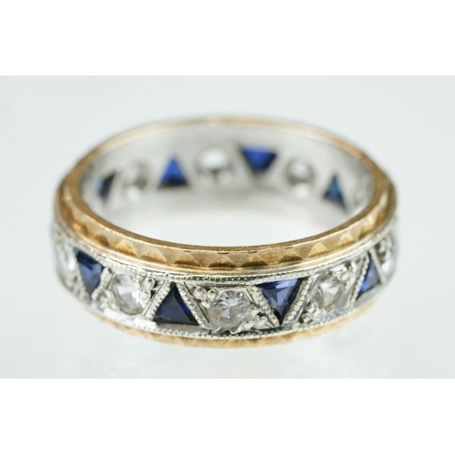 253 - Sapphire and white stone 9ct yellow and white gold eternity ring, ten small triangular mixed cut sap... 