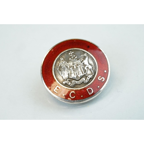 100 - Coin brooches to include two Victorian shield back coins, together with enamelled silver pendant med... 