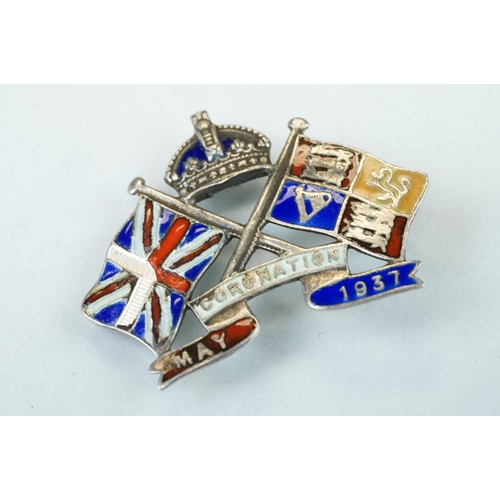 100 - Coin brooches to include two Victorian shield back coins, together with enamelled silver pendant med... 