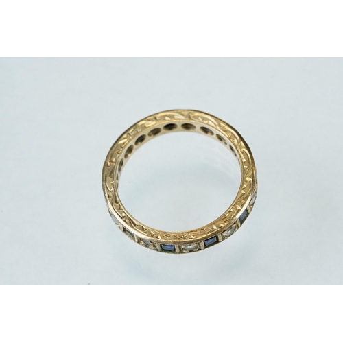 165 - Sapphire and white stone 9ct yellow gold eternity ring, alternate square mixed cut diamonds, round m... 