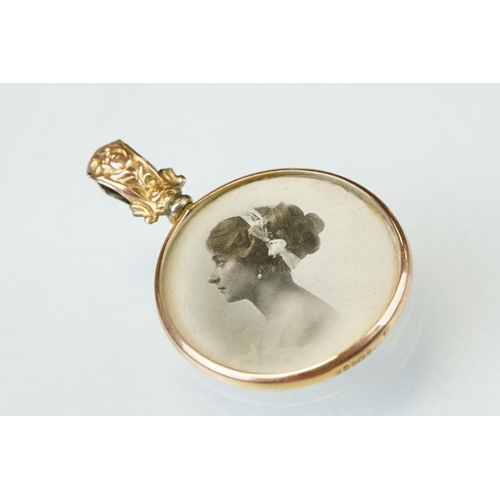 168 - Late Victorian / Edwardian 9ct yellow gold portrait fob, repoussé foliate decoration to the bale; to... 