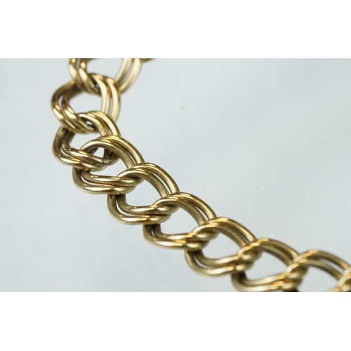 169 - 9ct yellow gold double link curb link bracelet, bolt ring clasp, safety chain, length approx 19.5 cm