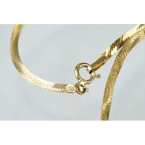 172 - 9ct gold wishbone necklace, together with a pair of 18ct yellow gold stud earrings, and two single 9... 