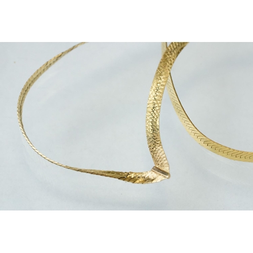 172 - 9ct gold wishbone necklace, together with a pair of 18ct yellow gold stud earrings, and two single 9... 