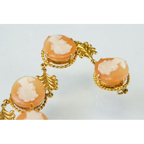 173 - Shell cameo 9ct yellow gold bracelet, six round cameo panels each depicting a female head, claw sett... 