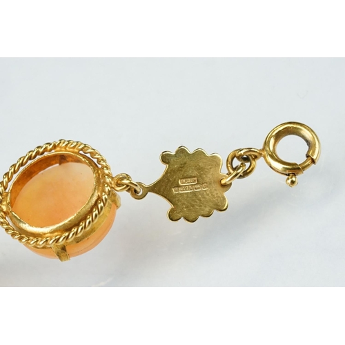 173 - Shell cameo 9ct yellow gold bracelet, six round cameo panels each depicting a female head, claw sett... 