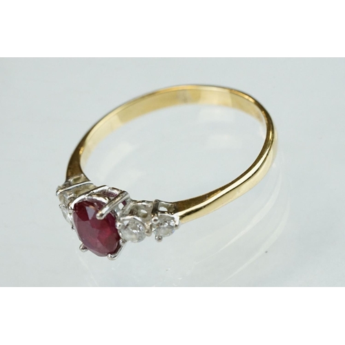 177 - Ruby and diamond yellow and white gold ring, hallmarks rubbed, oval mixed cut ruby, dimensions appro... 