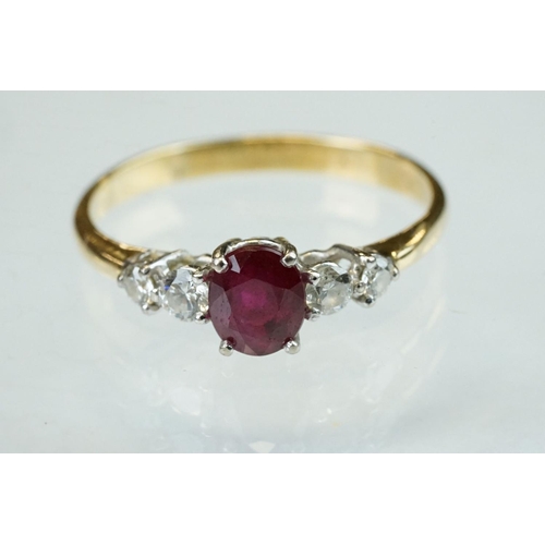 177 - Ruby and diamond yellow and white gold ring, hallmarks rubbed, oval mixed cut ruby, dimensions appro... 