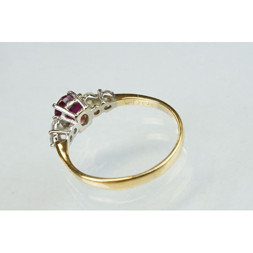 177 - Ruby and diamond yellow and white gold ring, hallmarks rubbed, oval mixed cut ruby, dimensions appro... 