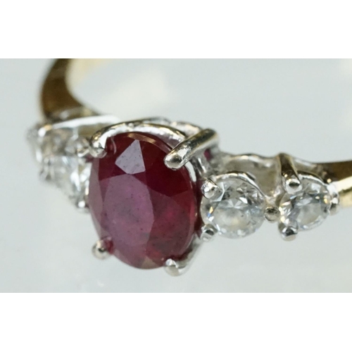 177 - Ruby and diamond yellow and white gold ring, hallmarks rubbed, oval mixed cut ruby, dimensions appro... 