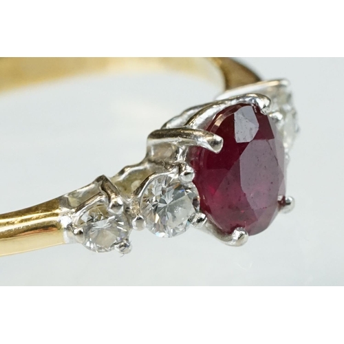 177 - Ruby and diamond yellow and white gold ring, hallmarks rubbed, oval mixed cut ruby, dimensions appro... 