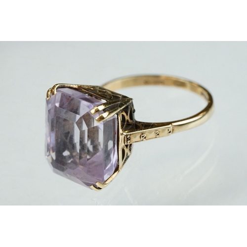 178 - Amethyst 9ct yellow gold dress ring, the rectangular mixed cut amethyst measuring approx 13.5mm x 11... 