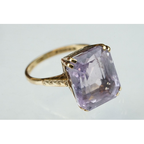 178 - Amethyst 9ct yellow gold dress ring, the rectangular mixed cut amethyst measuring approx 13.5mm x 11... 