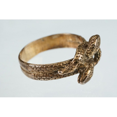 262 - 9ct rose gold ring modelled as two entwined snakes, width at widest point approx 10mm, ring size N½