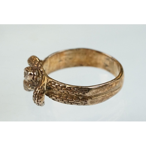 262 - 9ct rose gold ring modelled as two entwined snakes, width at widest point approx 10mm, ring size N½