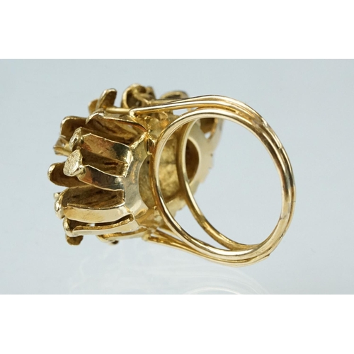 266 - Diamond yellow metal fancy cluster ring, textured stylised leaves in cluster formation, six small ro... 